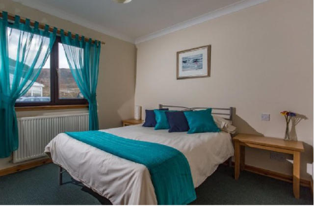 camera da letto al Mary's Cottages