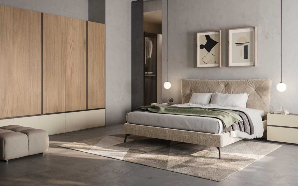 La camera da letto, pochi elementi per la stanza del riposo